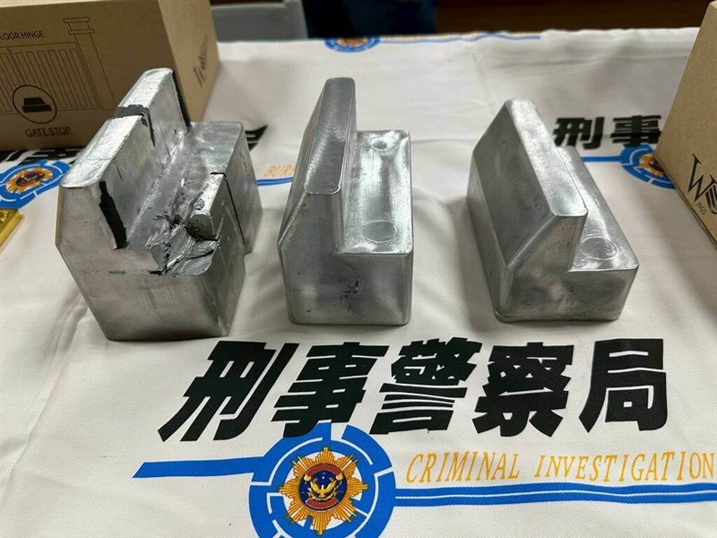 Lead-alloy doorstops containing hidden gold bars are seen after being seized by law enforcement authorities. Photo courtesy of a private contributor