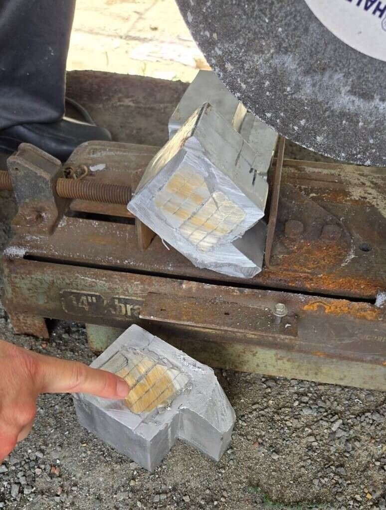 The gold bars hidden inside the lead-alloy doorstops. Photo courtesy of a private contributor