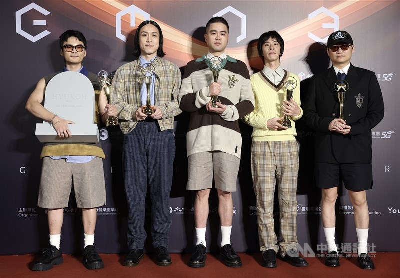 Members of the music band AAA pose with their Best Vocal Album Recording award on Saturday. CNA photo June 28, 2025