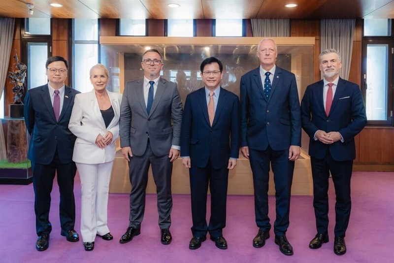 FM Lin Chia-lung (3rd from right) poses with Polish lawmakers Łukasz Horbatowski (3rd from left), Marek Chmielewski (2nd from right), and Iwona Krawczyk (2nd from left) in Taipei Tuesday. Photo courtesy of the Ministry of Foreign Affairs July 1, 2025