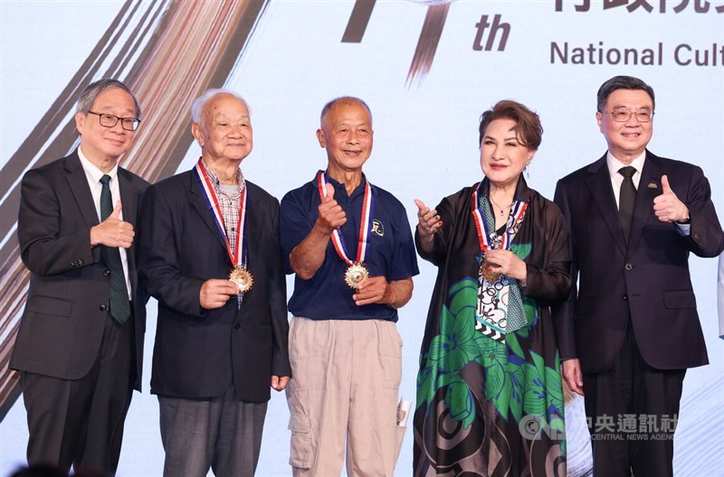 From left, Premier Cho Jung-tai; award winners author Wu Cheng, Hakka traditional builder Fu Ming-guang, and Taiwanese opera performer Yang Li-hua; and Minister of Culture Li Yuan pose for a photo during a ceremony in Taipei on Thursday. CNA photo July 10, 2025