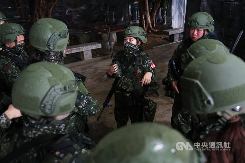 Soldiers gather for a debriefing on Friday. CNA photo July 11, 2025