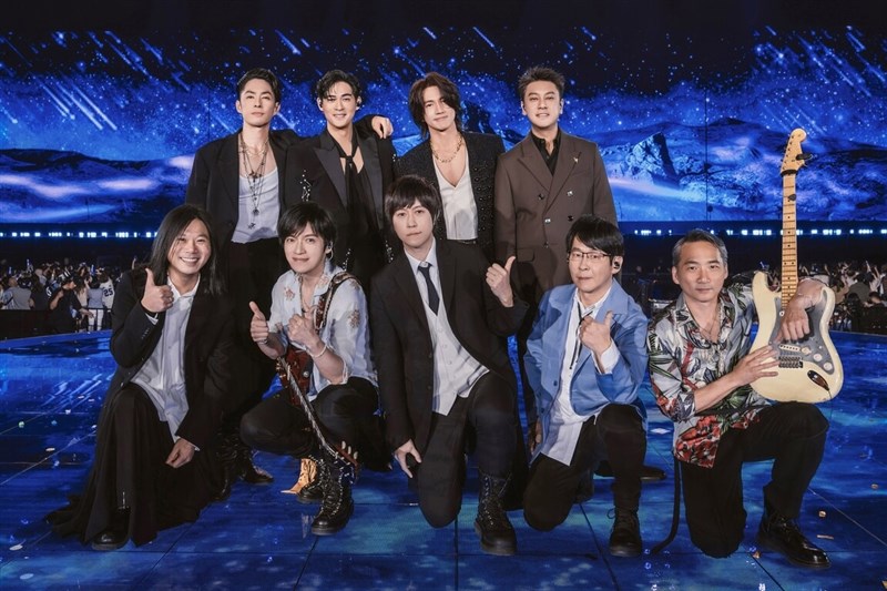 Members of Mayday (front row) pose with idol boy group F4 (back row) for a photo at Taipei Arena Saturday. Photo courtesy of B'in Music July 13, 2025