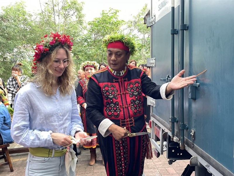 Shizi Township Chief Paljaljim Matuljitulj (right) and Sofia Lopushanskaya, an art conservator at Sweden’s National Museums of World Culture, unbox Paiwan artifacts in Pingtung on Thursday. Photo courtesy of the Shizi Township Office July 17, 2025