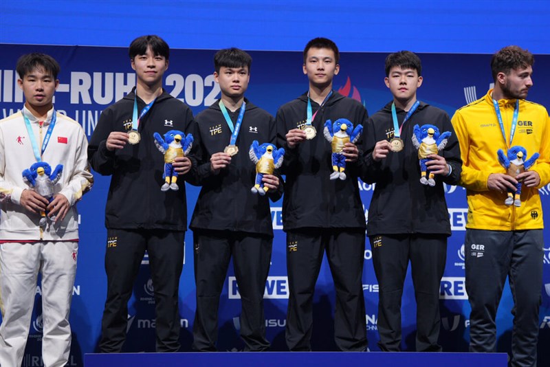Taiwanese paddlers (in black) show off their gold medals on the award podium on Sunday. Photo courtesy of the Chinese Taipei University Sports Federation.