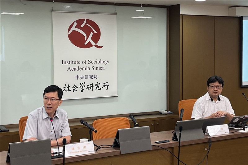 Lee Chih-te (right), former chief of the now-disbanded Asia Fact Check Lab, prepares to present a report titled “CCP Propaganda in Taiwan” during a seminar held by Academia Sinica’s Institute of Sociology in Taipei on Tuesday. CNA photo July 22, 2025