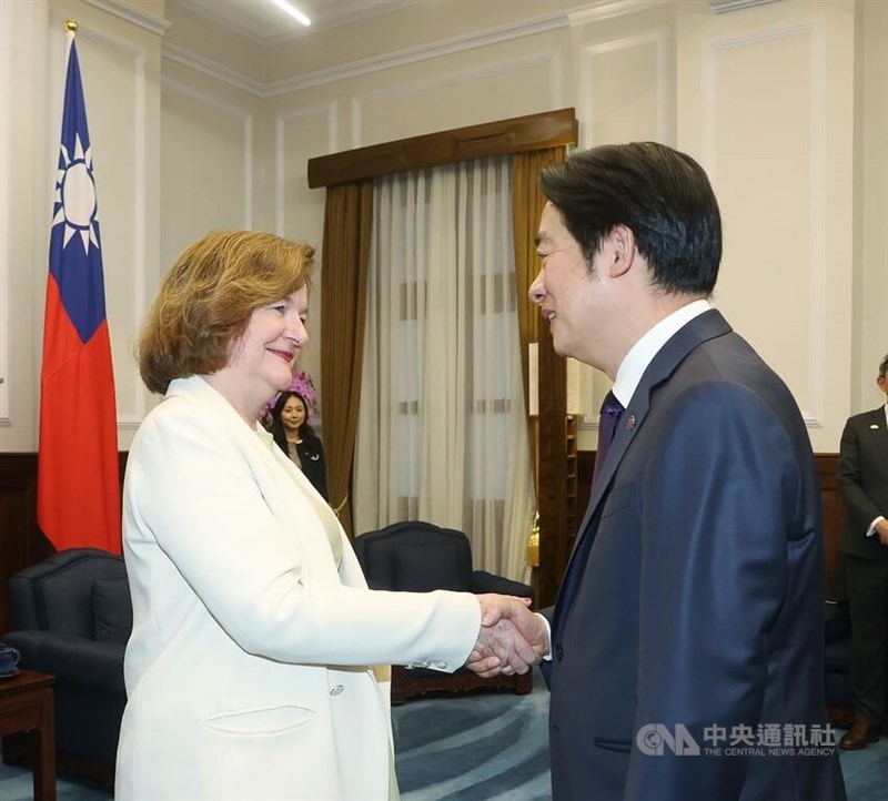 President Lai Ching-te (right) shakes hands with Nathalie Loiseau, chair of the European Parliament’s Subcommittee on Security and Defence, in Taipei on Tuesday. CNA photo July 22, 2025