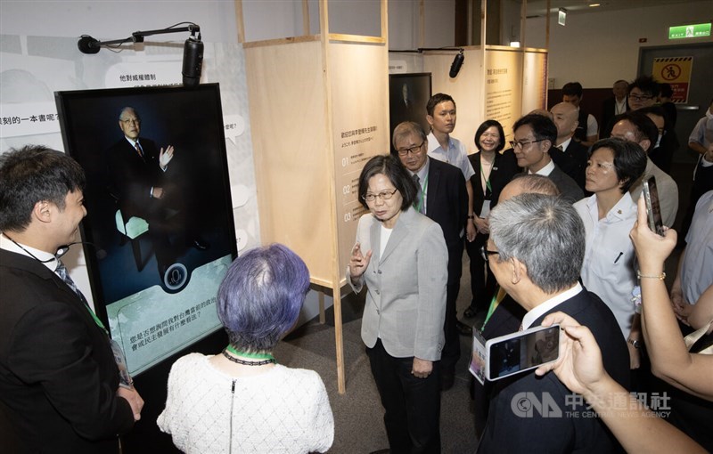 Former President Tsai Ing-wen (center) attends the "PROTOTYPE: Mr. Democracy 2.0" exhibition in New Taipei on Wednesday. CNA photo July 30, 2025