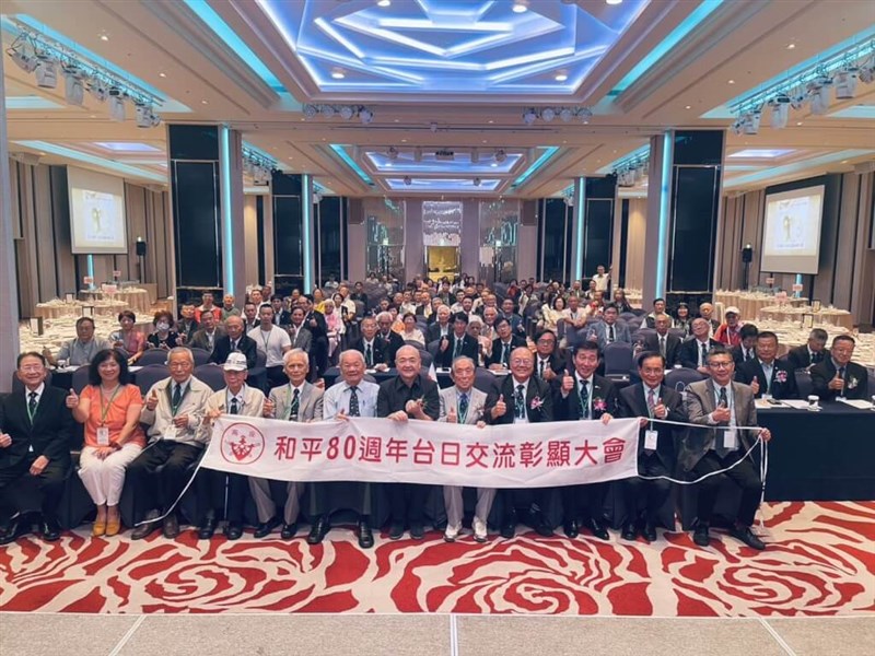 Former Taichung City Councilor Ho Chun-shu (front, sixth left) poses for a photo during a memorial event in Taichung on Aug. 2. Photo courtesy of Ho Chun-shu CNA photo Aug. 15, 2025