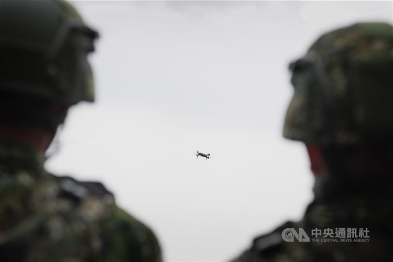 Two military personnel observe a drone in operation during the 2025 Han Kuang military exercises in this CNA file photo