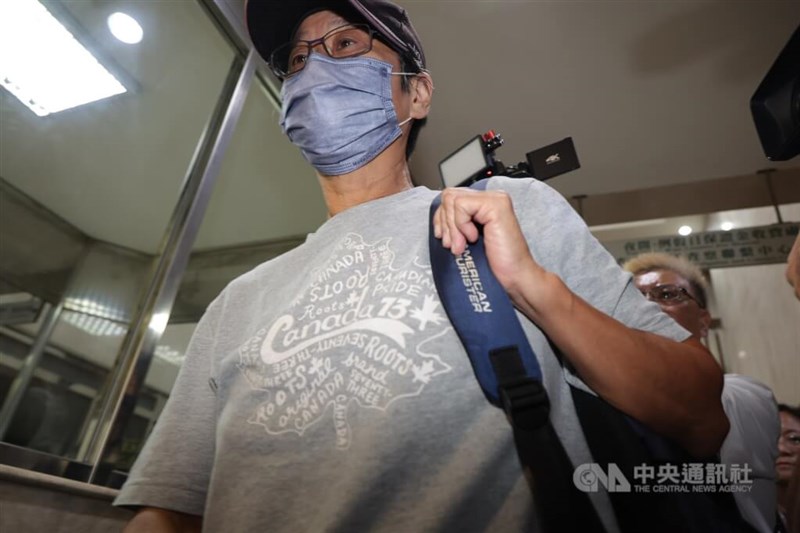 Former National Taiwan Normal University women’s soccer coach Chou Tai-ying is escorted to the Taipei District Prosecutors Office on Monday for further questioning. CNA photo Aug. 25, 2025