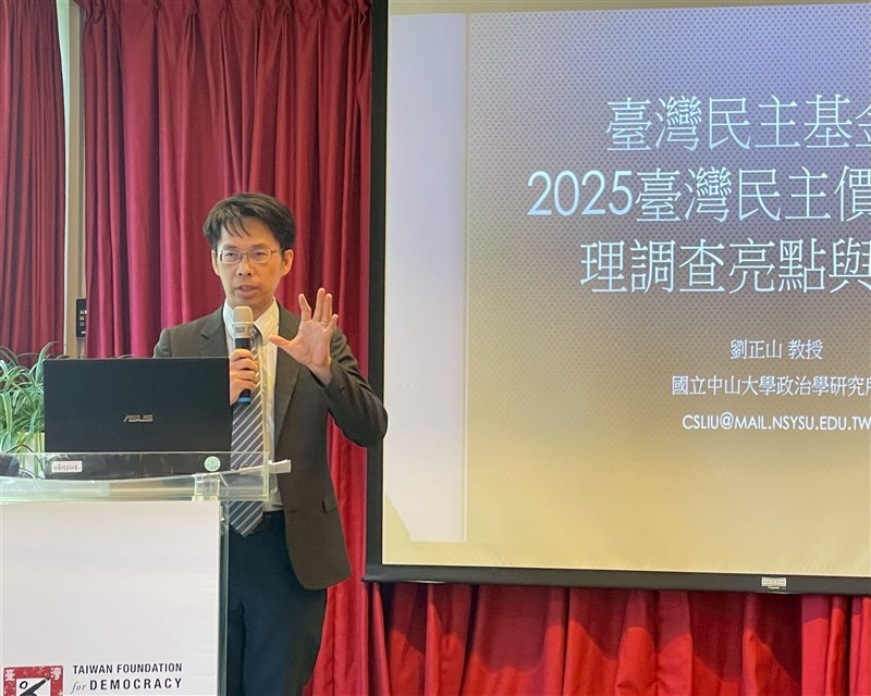 Frank Liu, political science professor at National Sun Yat-sen University, speaks at the launch of the survey on Thursday. CNA photo Aug. 28, 2025