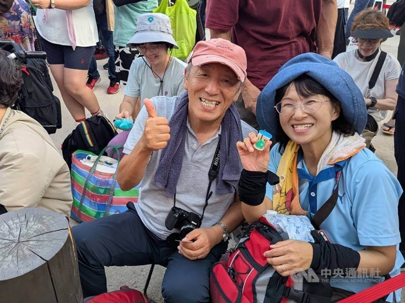 A Japanese pose for a picture before the start of Taiwan's "A Ritual of Gratitude Before the Temple" at the Expo 2025 Osaka on Thursday. CNA photo Aug. 28, 2025