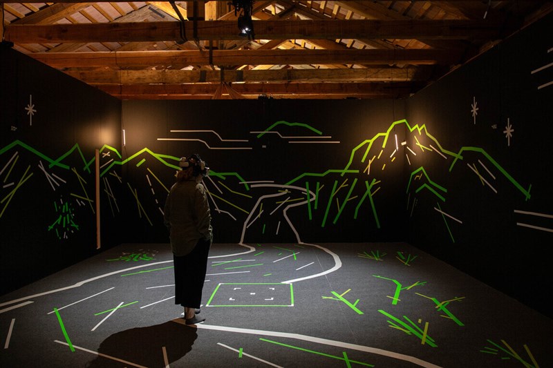 An audience member experiences Taiwanese director Singing Chen's VR work, "The Clouds Are Two Thousand Meters Up," which won the Grand Prize in the Venice Immersive section at the 82nd Venice Film Festival in this undated photo. Photo courtesy of TAICCA
