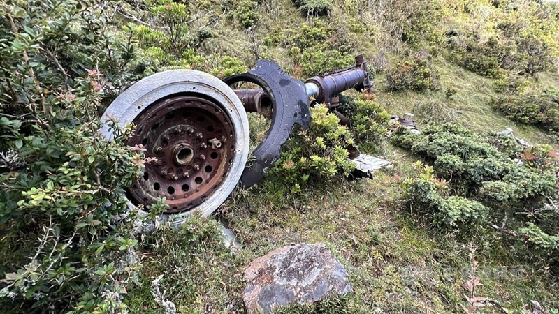 The rusted engine was found at the Sancha Mountain plane crash site in southern Taiwan. CNA photo, Sept. 10, 2025