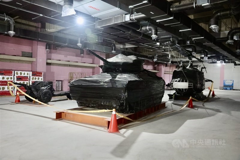A M5A1 tank and an OH-13 helicopter are set to become permanent exhibits inside the under construction-museum. CNA photo Sept. 14, 2025