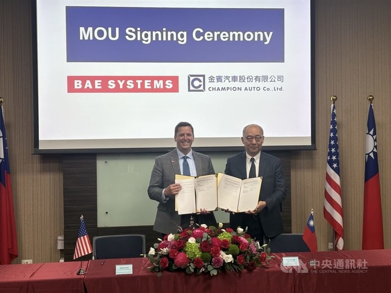 Taoyuan-based Champion Auto Co. Vice General Manager Li Ta-Yung (right) and BAE Vice President Andy Corea (left) sign the MOU in Taipei on Friday. CNA photo Sept. 19, 2025