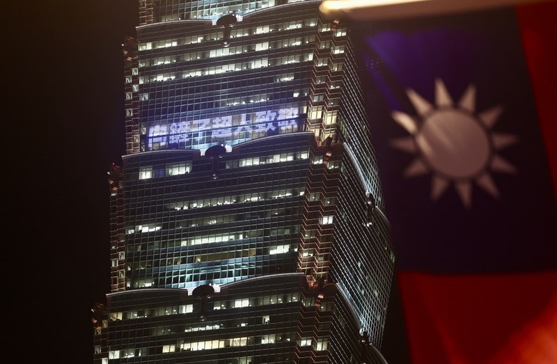 Taipei 101 lit up its exterior with the message 'Tribute to Shovel Superheroes' to honor frontline rescue workers who clean up the flood-devastated Guangfu Township, Hualien County on Tuesday. CNA photo Sept. 30, 2025