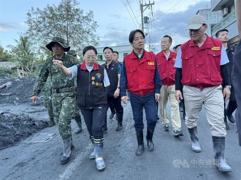 President Lai Ching-te (front, third left), Hualien County Magistrate Hsu Chen-wei (front, second left) and Central Emergency Operation Center chief coordinator Chi Lien-cheng (front first right) inspect damages in Hualien County's Guangfu Township on Sunday. CNA photo Oct. 5, 2025