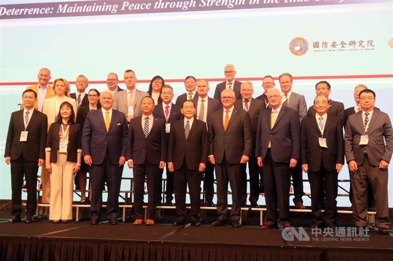 Former Australian Prime Minister Scott Morrison (front fourth left) poses for a photo at the 2025 Taipei Security Dialogue in Taipei on Wednesday. CNA photo Oct. 8, 2025