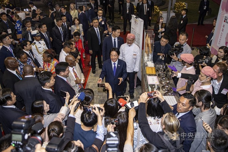 President Lai Ching-te (center) speaks to the media while attending the National Day reception in Taipei on Friday. CNA photo Oct. 10, 2025