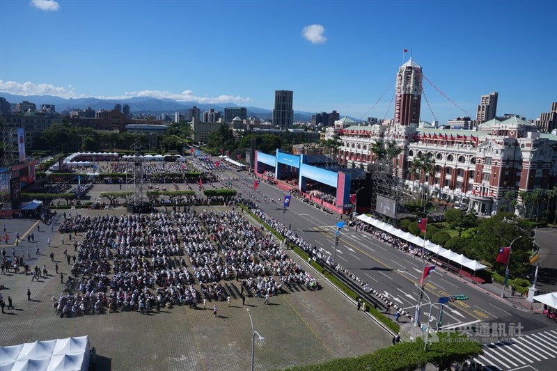Local officials, foreign dignitaries and event attendees gather around Taiwan's Presidential Office to celebrate the National Day of the Republic of China. CNA photo Oct. 10, 2025