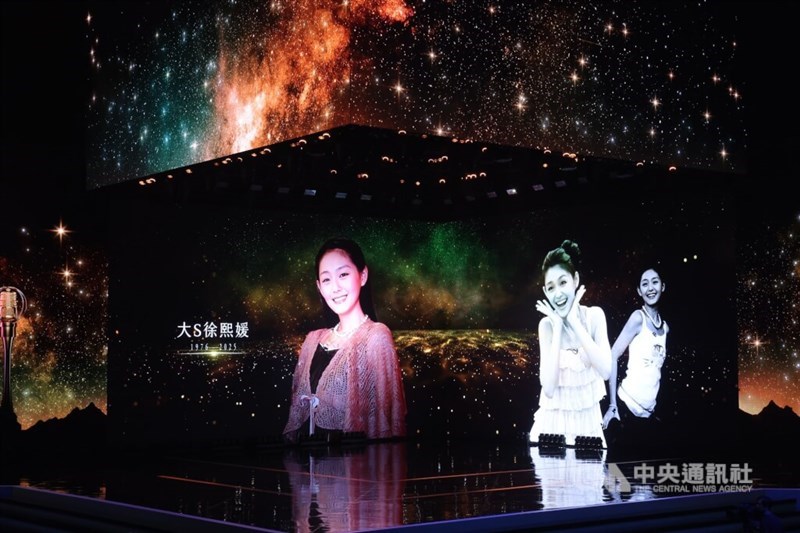 A slideshow commemorating Dee Hsu’s late sister, actress Barbie Hsu, is displayed during the award ceremony in Taipei on Friday. CNA photo Oct. 17, 2025
