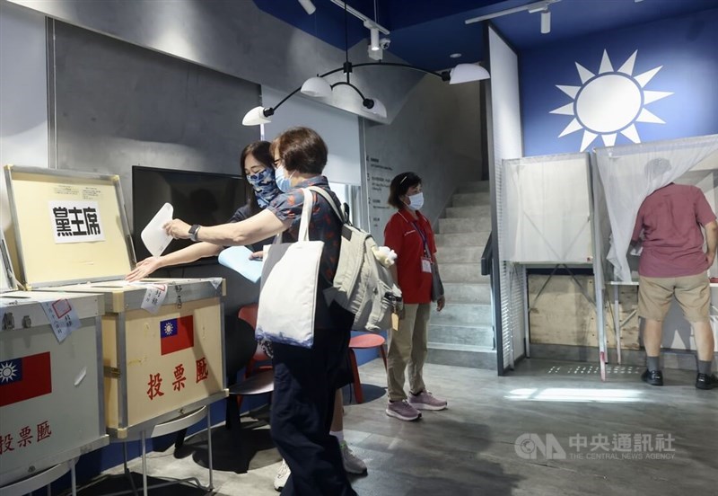 Members of the KMT cast their votes at a polling station in Taipei during the party's chairperson election on Saturday. CNA photo Oct. 18, 2025