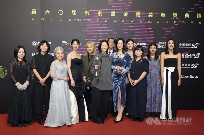 The cast and crew of "Crown Shyness" pose for a photo backstage after receiving the Best TV Movie award in Taipei on Saturday. CNA photo Oct. 18, 2025