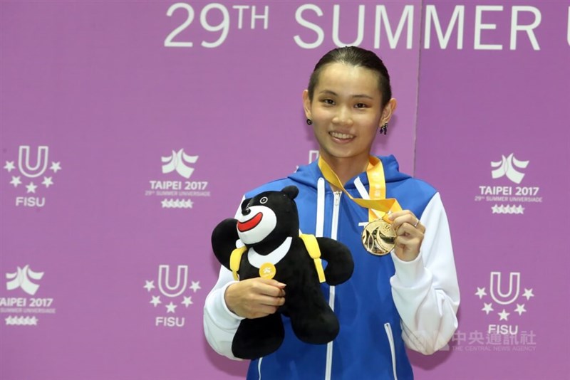 Tai shows her gold medal to the camera after winning the 29th Summer Universiade in Taipei in 2017. CNA file photo
