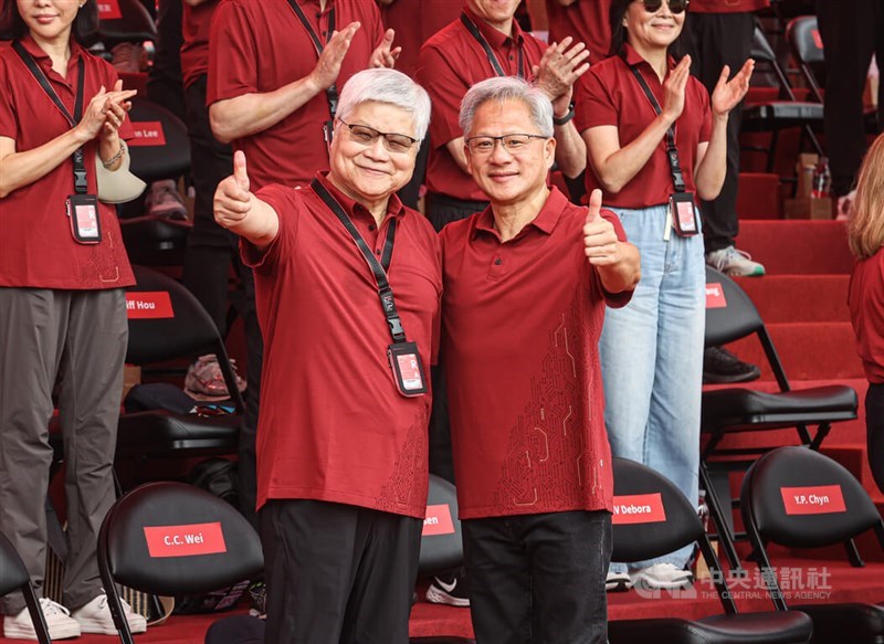 Nvidia founder Jensen Huang (right) and TSMC Chairman and CEO C.C. Wei. CNA photo Nov. 8, 2025