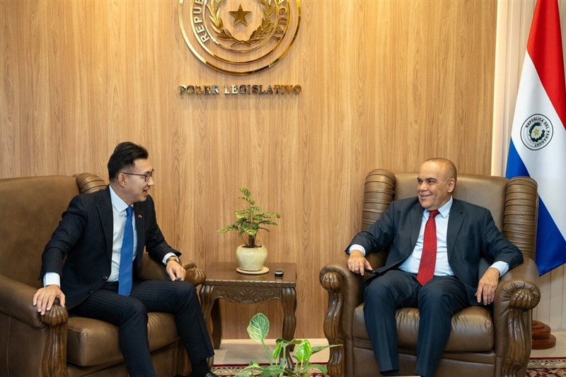 Deputy Legislative Speaker Johnny Chiang (left) greets Basilio Gustavo Núñez Giménez, president of Paraguay’s Congress and Senate, in Paraguay on Thursday. Photo courtesy of the Legislative Yuan
