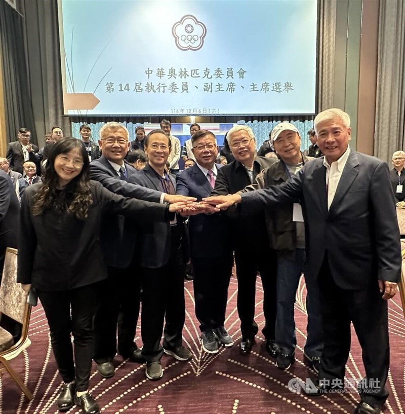 Tsai Chia-fu (center) and Chen Mei-yen (far left) pose with other elected committee members on Saturday. CNA photo Dec. 6, 2025