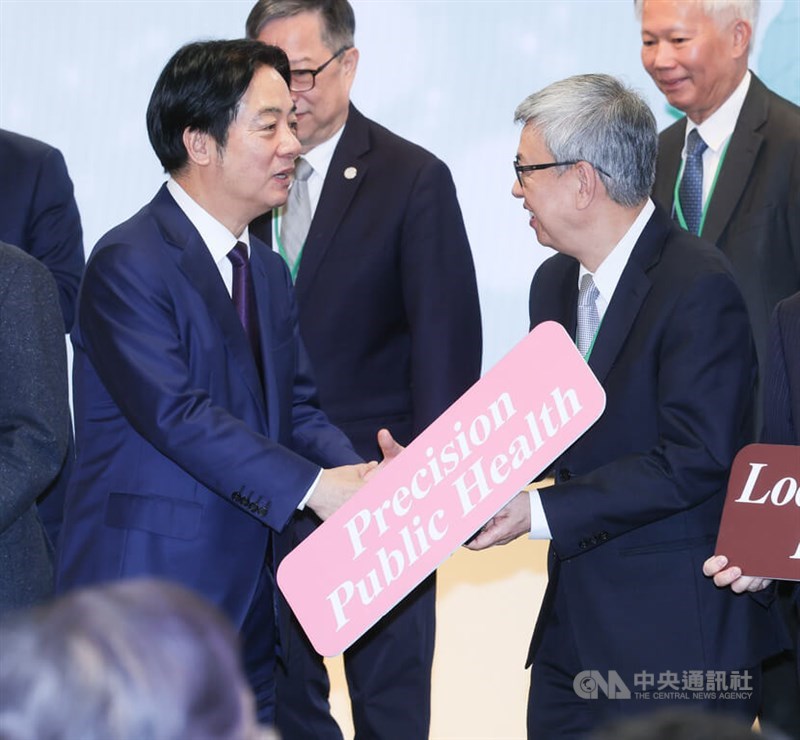 President Lai Ching-te (left) greets former Vice President Chen Chien-jen (right) on the Wednesday event in Taipei. CNA photo Dec. 17, 2025