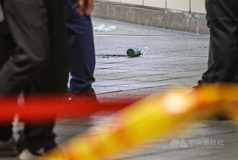 The remaining shell of a smoke grenade is seen on the ground at the scene of the incident at MRT Taipei Main Station on Friday. CNA photo Dec. 19, 2025