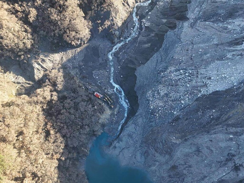 Heavy machinery is seen at the crest of a barrier lake on Matai'an Creek in eastern Taiwan on Dec. 28. Photo courtesy of the Forestry and Nature Conservation Agency
