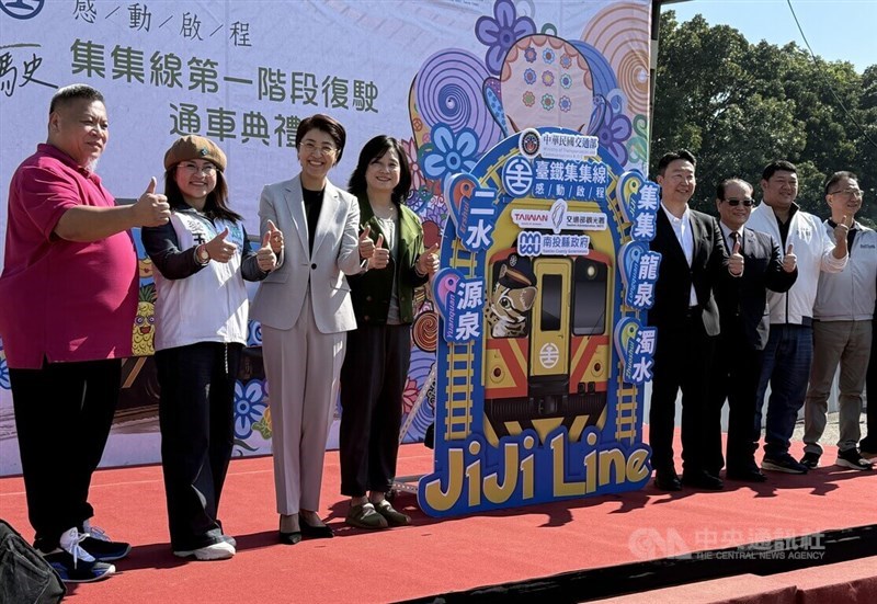 Transportation Minister Chen Shih-kai (fourth right), Taiwan Railways Corp chairman Cheng Kuang-yuan (third right), Nantou County magistrate Hsu Shu-hua (third left) and other officials pose for a photo at Jiji Station in Nantou County on Monday. CNA photo Jan. 5, 2025