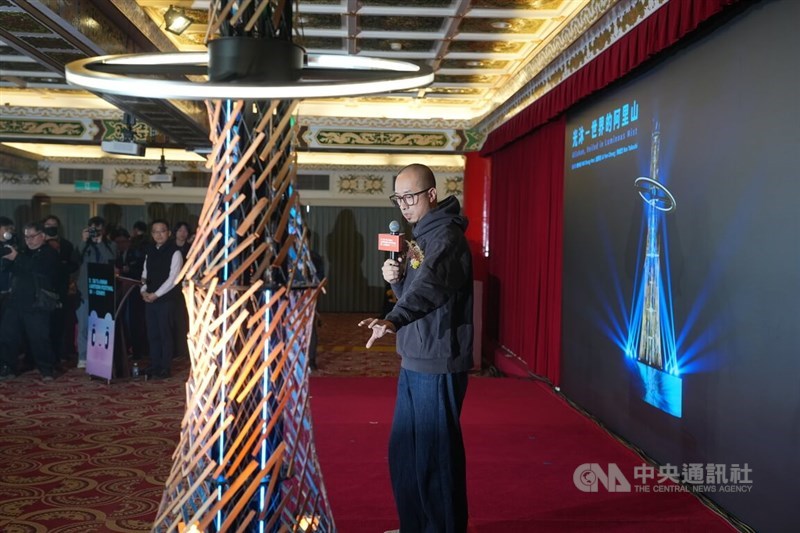 Artist Yao Chung-han introduces the "Alishan, Veiled in Luminous Mist" lantern during a press conference in Taipei on Friday. CNA photo Jan. 9, 2026