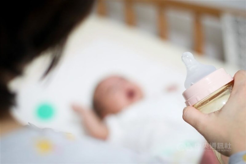 A newborn gets ready to be fed in this CNA file photo for illustrative purpose
