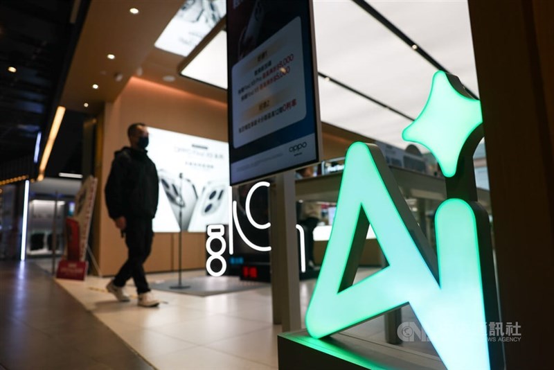 A consumer enters an electronics store that carries AI supported products in this CNA file photo
