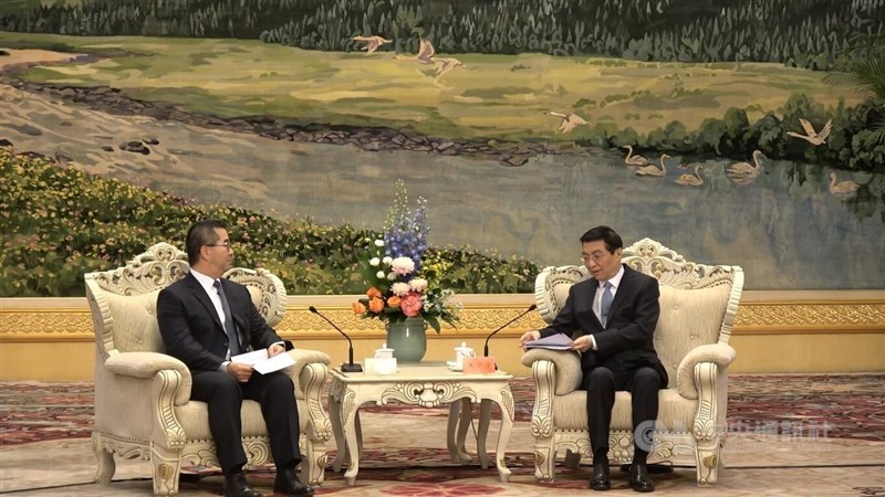 Kuomintang Vice Chairman Hsiao Hsu-tsen (left) and Wang Huning (front right), chairman of the National Committee of the Chinese People's Political Consultative Conference speak in Beijing on Wednesday. CNA photo Feb. 4, 2026
