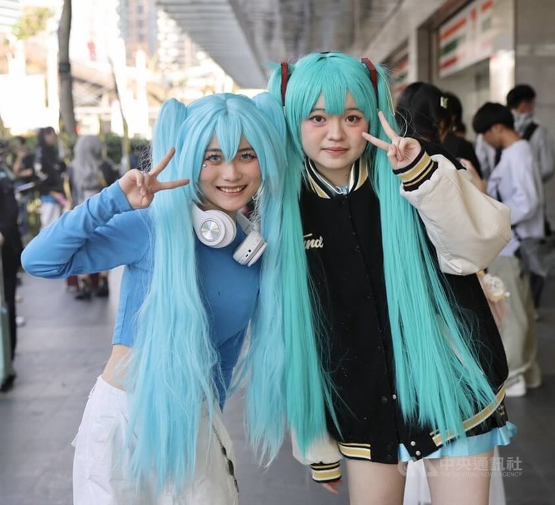 Cosplayers dressed up as virtual singer Hatsune Miku pose for a photo outside TICA's venue on Thursday. CNA photo Feb. 5, 2026
