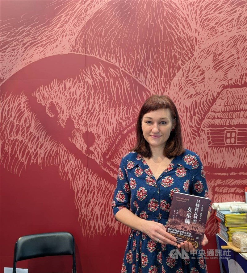 Czech author Kateřina Tučková poses with the Chinese translation of her novel "the Last Goddess" at the Taipei International Book Exhibition in early February. CNA photo Feb. 22, 2026