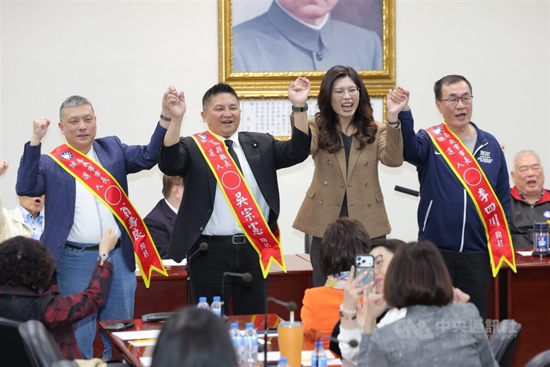 KMT Chairwoman Cheng Li-wun (second from right) poses for a photo with the three candidates at a meeting of the party's Central Standing Committee on Wednesday. CNA photo March 11, 2026