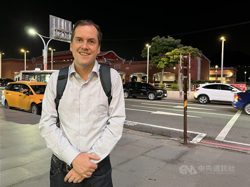 Alex, a German national who has lived in Tamsui for 19 years, shares his thoughts on the Danjiang Bridge outside Tamsui MRT Station in early October 2025. CNA photo March 11, 2026
