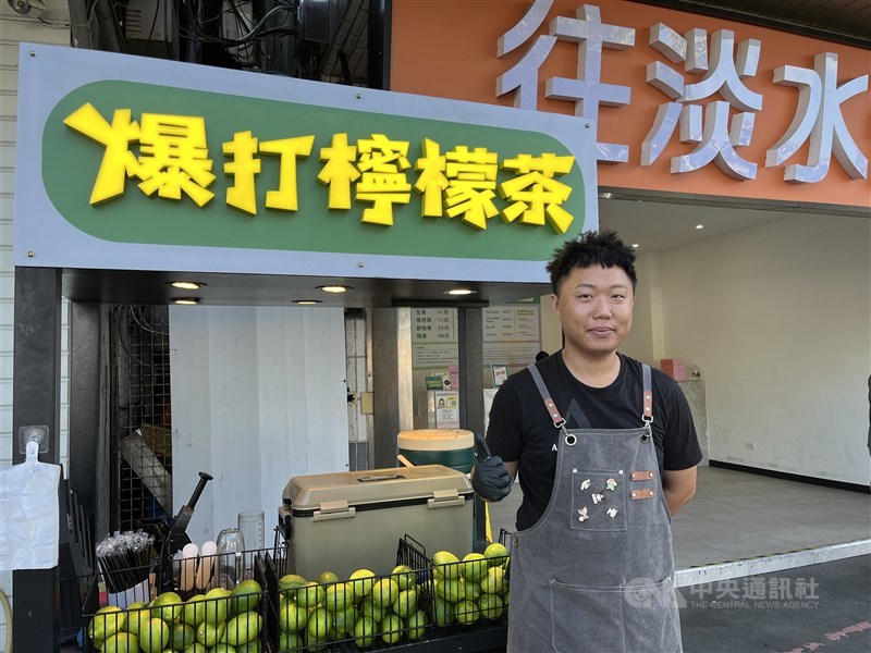 Johnson Huang stands next to his lemon tea shop on Bali Old Street as he prepares to open for the day in early October 2025. CNA photo March 11, 2026