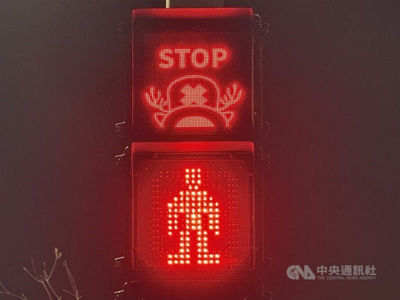 A Chopper-themed pedestrian light in Kaohsiung shows a stop signal. CNA photo March 13, 2026