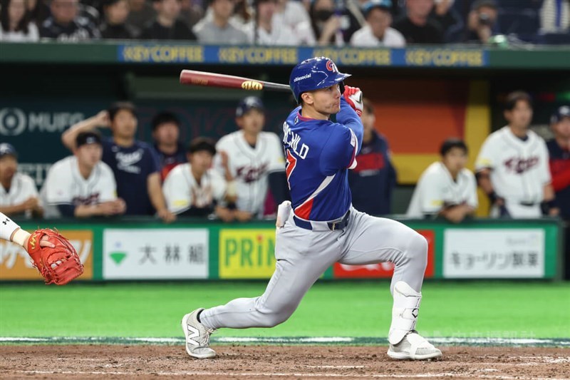 Stuart Fairchild hits a two-run homer during Team Taiwan's game against South Korea at the Tokyo Dome on March 8. CNA file photo