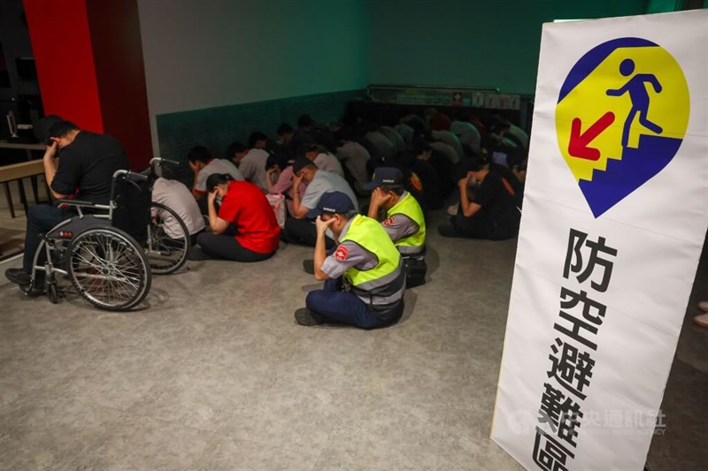 Locals and staff take cover at a designated air-raid shelter area in New Taipei during Taiwan’s Urban Resilience Exercises in July 2025. CNA file photo