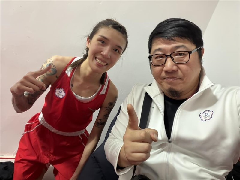 Taiwanese boxer Huang Hsiao-wen (left) poses with her coach Liu Tsung-tai on Friday. Photo courtesy of Liu Tsung-tai April 3, 2026